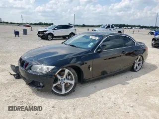 2013 BMW 3 Series 335i with VIN WBADX7C58DJ590300, listed as a Copart auction lot 59282855 with 97,001 mi miles and Salvage title. Bid and sale history available at DreamBid. Image 1.