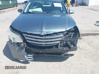 2010 Chrysler Sebring Limited with VIN 1C3CC5FB2AN207816, listed as a IAAI auction lot 41977487 with 130,052 mi miles and . Bid and sale history available at DreamBid. Image 6.