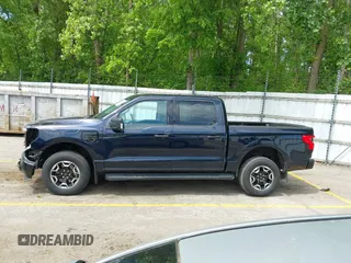 2023 Ford F-150 Lightning Pro with VIN 1FTVW1EL6PWG30061, listed as a IAAI auction lot 42362295 with 22,481 mi miles and . Bid and sale history available at DreamBid. Image 14.