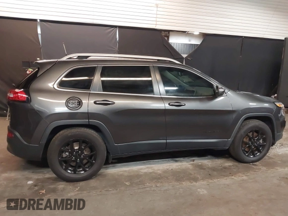 2016 Jeep Cherokee Latitude with VIN 1C4PJMCS4GW360475, listed as a IAAI auction lot 41479053 with 154,554 mi miles. Bid and sale history available at carsss.com. Image 14.