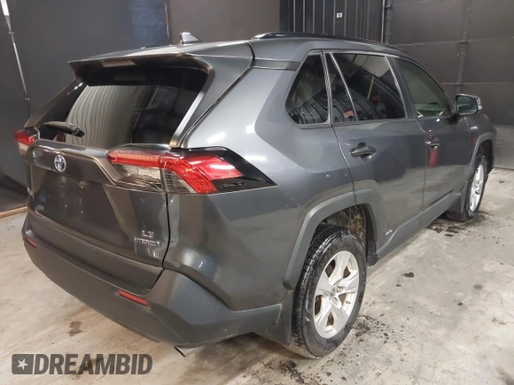 2019 Toyota RAV4 Hybrid LE with VIN JTMMWRFV8KD036053, listed as a IAAI auction lot 42502103 with 94,113 mi miles and . Bid and sale history available at DreamBid. Image 4.