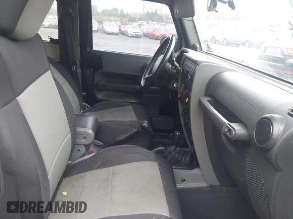 2007 Jeep Wrangler Rubicon with VIN 1J4GA64117L149666, listed as a IAAI auction lot 42252464 with 100,791 mi miles and . Bid and sale history available at DreamBid. Image 5.