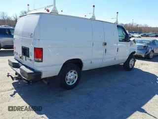2014 Ford Econoline Cargo Commercial with VIN 1FTSE3EL0EDA04144, listed as a IAAI auction lot 41833930 with 159,405 mi miles. Bid and sale history available at carsss.com. Image 4.