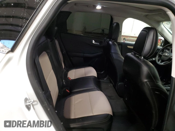 2021 Ford Escape Titanium Hybrid с VIN 1FMCU9DZ6MUA53908, выставлен на аукционе Copart как лот 85946674 с пробегом 31 476 миль миль и Списание • Salvage title. История ставок и продаж доступна на DreamBid. Изображение 11.