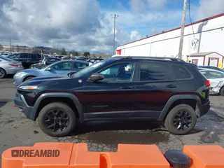 2015 Jeep Cherokee Trailhawk with VIN 1C4PJMBS7FW699392, listed as a IAAI auction lot 41797617 with 1 mi miles. Bid and sale history available at carsss.com. Image 14.
