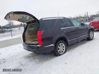 2009 Cadillac SRX AWD with VIN 1GYEE437390112841, listed as a IAAI auction lot 41317070 with NaN miles. Bid and sale history available at carsss.com. Image 4.
