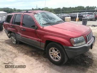 2004 Jeep Grand Cherokee Laredo with VIN 1J4GX48SX4C364464, listed as a IAAI auction lot 42296959 with 249,619 mi miles and . Bid and sale history available at DreamBid. Image 1.
