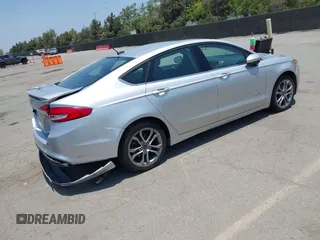 2017 Ford Fusion Hybrid SE с VIN 3FA6P0LU5HR285381, выставлен на аукционе IAAI как лот 42597789 с пробегом 129 662 миль миль и . История ставок и продаж доступна на DreamBid. Изображение 4.