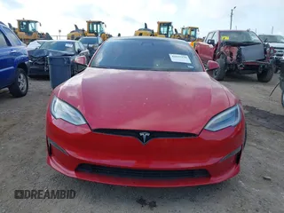 2021 Tesla Model S Plaid with VIN 5YJSA1E60MF447203, listed as a IAAI auction lot 42025120 with 58,190 mi miles. Bid and sale history available at carsss.com. Image 12.