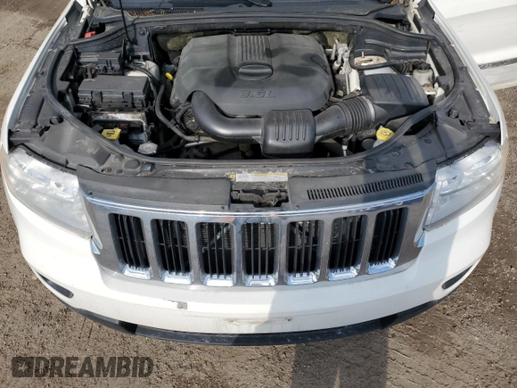 2011 Jeep Grand Cherokee Laredo z VIN 1J4RR4GG1BC506083, wystawiony jako Copart lot #58498295 z przebiegiem 122 847 mil mil oraz Czysty tytuł • Clean title. Historia ofert i sprzedaży dostępna na DreamBid. Obrazek 12.