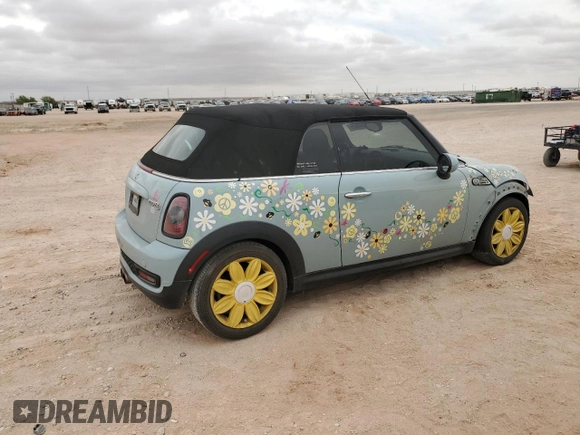 2014 MINI Convertible S with VIN WMWZP3C56ET707425, listed as a Copart auction lot 50894965 with 100,116 mi miles and Salvage Title. Bid and sale history available at DreamBid. Image 3.
