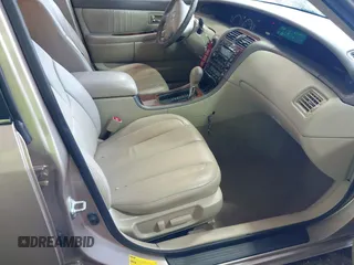 2002 Toyota Avalon XL with VIN 4T1BF28B12U260987, listed as a IAAI auction lot 42113276 with 181,537 mi miles and . Bid and sale history available at DreamBid. Image 5.