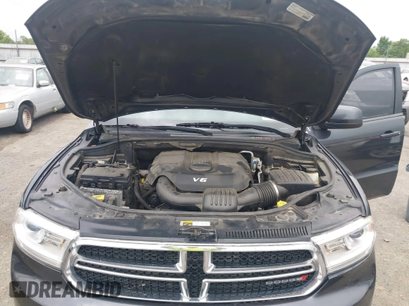 2014 Dodge Durango SXT with VIN 1C4RDJAG7EC307118, listed as a IAAI auction lot 42168781 with 92,977 mi miles and . Bid and sale history available at DreamBid. Image 10.
