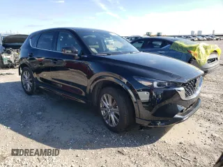 2023 Mazda CX-5 Signature with VIN JM3KFBXYXP0290991, listed as a Copart auction lot 41408485 with 19,952 mi miles and Salvage Title. Bid and sale history available at carsss.com. Image 4.