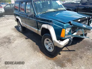 1996 Jeep Cherokee Country z VIN 1J4FJ78S7TL220447, wystawiony jako IAAI lot #42320197 z przebiegiem 274 650 mil mil oraz . Historia ofert i sprzedaży dostępna na DreamBid. Obrazek 1.