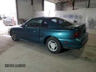 1996 Ford Mustang with VIN 1FALP4047TF229334, listed as a Copart auction lot 49257335 with 184,986 mi miles and Salvage Title. Bid and sale history available at carsss.com. Image 2.