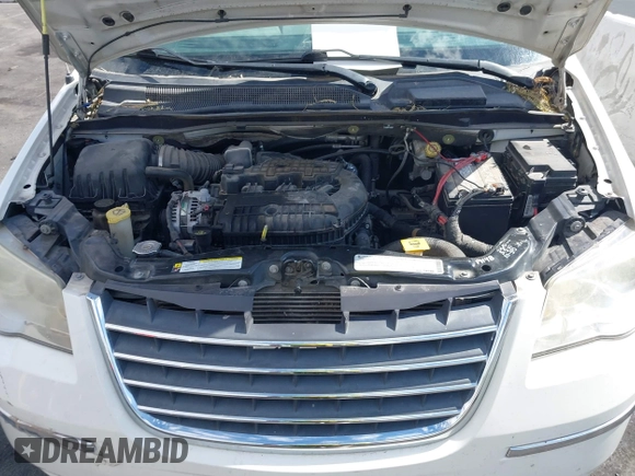 2010 Chrysler Town & Country Limited with VIN 2A4RR7DX1AR357668, listed as a IAAI auction lot 42173545 with 114,486 mi miles and . Bid and sale history available at carsss.com. Image 10.
