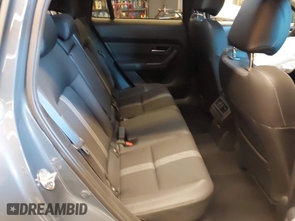 2024 Mazda CX-50 S Select with VIN 7MMVABAM8RN198360, listed as a IAAI auction lot 41206508 with 2,658 mi miles and . Bid and sale history available at DreamBid. Image 8.