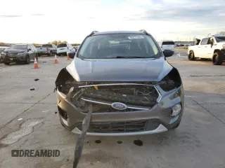 2017 Ford Escape SE with VIN 1FMCU0G91HUE07265, listed as a Copart auction lot 84231444 with 82,990 mi miles and Clean Title. Bid and sale history available at DreamBid. Image 5.