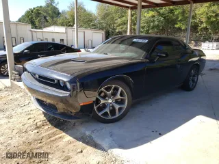 2016 Dodge Challenger SXT with VIN 2C3CDZAG4GH301432, listed as a Copart auction lot 74877564 with 116,427 mi miles and Salvage Title. Bid and sale history available at carsss.com. Image 1.