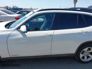 2014 BMW X1 sDrive28i with VIN WBAVM1C5XEVW53725, listed as a IAAI auction lot 41859427 with 181,892 mi miles. Bid and sale history available at carsss.com. Image 15.