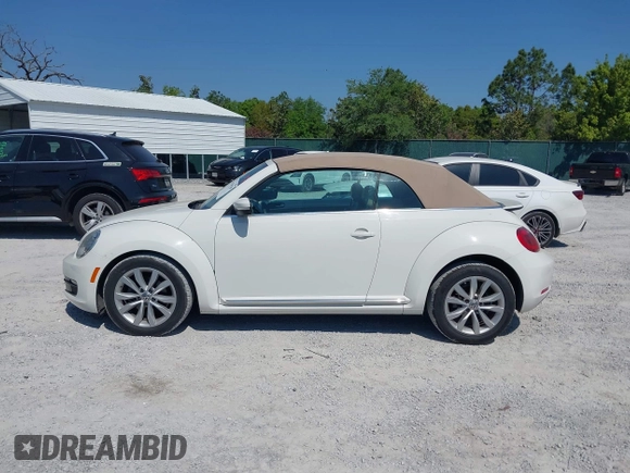 2013 Volkswagen Beetle 2.5L with VIN 3VW5P7AT3DM811617, listed as a IAAI auction lot 42055769 with 93,810 mi miles and . Bid and sale history available at DreamBid. Image 14.