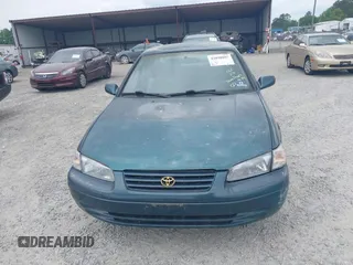 1997 Toyota Camry LE z VIN 4T1BG22K7VU005271, wystawiony jako IAAI lot #42098097 z przebiegiem Nie podano mil oraz . Historia ofert i sprzedaży dostępna na DreamBid. Obrazek 12.