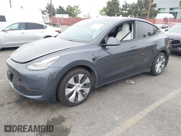 2021 Tesla Model Y Long Range with VIN 5YJYGDEEXMF092901, listed as a IAAI auction lot 42164866 with 61,240 mi miles and . Bid and sale history available at carsss.com. Image 25.