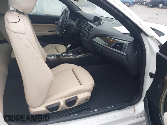 2017 BMW 2 Series with VIN WBA2M9C3XH7A47692, listed as a IAAI auction lot 42172525 with 69,504 mi miles and . Bid and sale history available at DreamBid. Image 5.