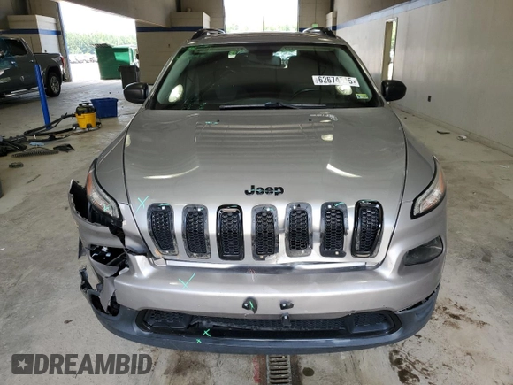 2017 Jeep Cherokee Altitude with VIN 1C4PJLABXHW586048, listed as a Copart auction lot 62674745 with 106,334 mi miles and Salvage title. Bid and sale history available at DreamBid. Image 5.