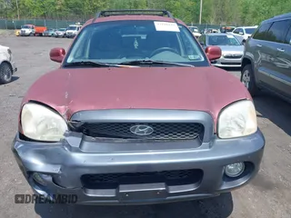 2003 Hyundai Santa Fe GLS z VIN KM8SC73D83U543841, wystawiony jako IAAI lot #42220132 z przebiegiem 215 325 mil mil oraz . Historia ofert i sprzedaży dostępna na DreamBid. Obrazek 6.