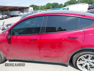 2023 Tesla Model Y Long Range z VIN 7SAYGAEE7PF691499, wystawiony jako IAAI lot #42038850 z przebiegiem 26 439 mil mil oraz . Historia ofert i sprzedaży dostępna na DreamBid. Obrazek 15.