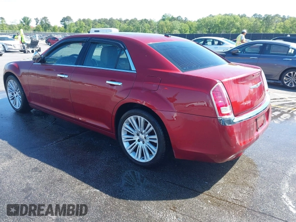 2012 Chrysler 300 Limited with VIN 2C3CCACG5CH165341, listed as a IAAI auction lot 42036190 with 184,536 mi miles. Bid and sale history available at carsss.com. Image 3.