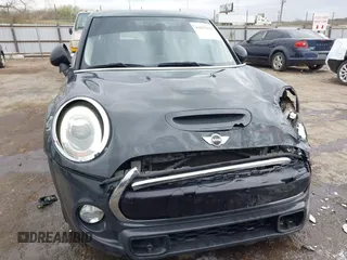 2017 MINI Hardtop 4 Door Cooper S z VIN WMWXU3C3XH2F49201, wystawiony jako IAAI lot #41837027 z przebiegiem 75 949 mil mil oraz . Historia ofert i sprzedaży dostępna na DreamBid. Obrazek 13.