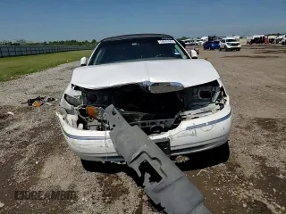 2001 Lincoln Town Car Cartier z VIN 1LNHM83W91Y728971, wystawiony jako Copart lot #50643965 z przebiegiem Nie podano mil oraz Szkoda całkowita • Salvage title. Historia ofert i sprzedaży dostępna na DreamBid. Obrazek 11.