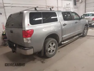 2011 Toyota Tundra 4WD Truck with VIN 5TFDW5F16BX187753, listed as a IAAI auction lot 42003416 with 239,476 mi miles. Bid and sale history available at carsss.com. Image 4.