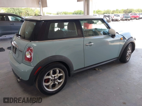 2012 MINI Hardtop with VIN WMWSU3C55CT261047, listed as a IAAI auction lot 42160995 with 123,879 mi miles and . Bid and sale history available at DreamBid. Image 4.