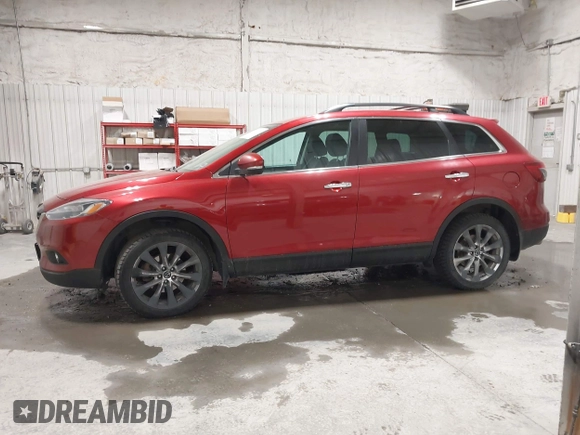 2015 Mazda CX-9 Grand Touring z VIN JM3TB3DAXF0464215, wystawiony jako IAAI lot #42043092 z przebiegiem 119 269 mil mil oraz . Historia ofert i sprzedaży dostępna na DreamBid. Obrazek 14.