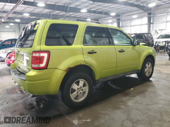 2012 Ford Escape XLT with VIN 1FMCU9D7XCKA07488, listed as a Copart auction lot 58605185 with 144,578 mi miles and Salvage title. Bid and sale history available at DreamBid. Image 3.