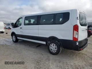 2021 Ford Transit Passenger XL with VIN 1FBAX2Y8XMKA49422, listed as a Copart auction lot 86907214 with 82,199 mi miles and Clean Title. Bid and sale history available at DreamBid. Image 2.