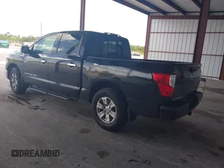 2018 Nissan Titan SV with VIN 1N6AA1E63JN512230, listed as a IAAI auction lot 42000705 with 64,479 mi miles and . Bid and sale history available at DreamBid. Image 3.