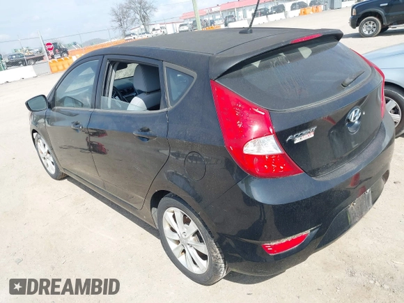 2012 Hyundai Accent SE with VIN KMHCU5AE8CU015055, listed as a IAAI auction lot 41814610 with 141,769 mi miles. Bid and sale history available at carsss.com. Image 3.