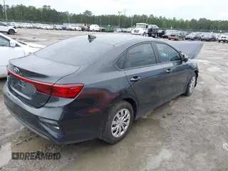 2021 Kia Forte LXS with VIN 3KPF24AD4ME266471, listed as a IAAI auction lot 41972334 with 54,346 mi miles and . Bid and sale history available at DreamBid. Image 4.