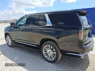 2023 Cadillac Escalade 4WD Premium Luxury z VIN 1GYS4BKL7PR332923, wystawiony jako Copart lot #57442025 z przebiegiem 56 886 mil mil oraz Tytuł czysty. Historia ofert i sprzedaży dostępna na DreamBid. Obrazek 2.