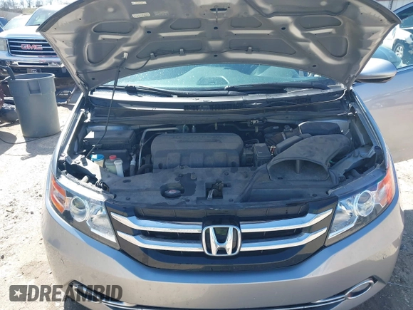 2016 Honda Odyssey Touring Elite with VIN 5FNRL5H96GB090653, listed as a IAAI auction lot 41720195 with 68,969 mi miles. Bid and sale history available at carsss.com. Image 10.