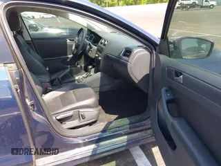 2014 Volkswagen Jetta SE z VIN 3VWD17AJ5EM309737, wystawiony jako IAAI lot #42250688 z przebiegiem 115 945 mil mil oraz . Historia ofert i sprzedaży dostępna na DreamBid. Obrazek 5.