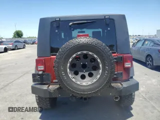 2009 Jeep Wrangler Rubicon with VIN 1J4GA64169L764202, listed as a Copart auction lot 58241585 with 69,189 mi miles and Clean title. Bid and sale history available at DreamBid. Image 6.