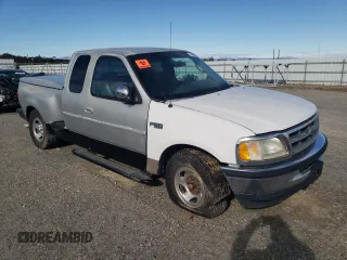 2001 Ford F-150 XL with VIN 1FTZX07261KF67717, listed as a Copart auction lot 78946214 with Not provided miles and Salvage title. Bid and sale history available at DreamBid. Image 4.