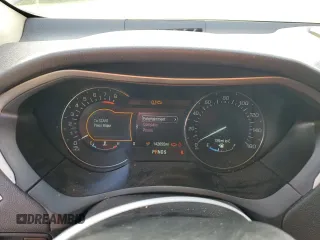 2016 Lincoln MKZ z VIN 3LN6L2G97GR614647, wystawiony jako Copart lot #55955655 z przebiegiem 142 655 mil mil oraz Szkoda całkowita • Salvage title. Historia ofert i sprzedaży dostępna na DreamBid. Obrazek 9.