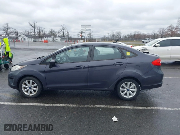 2012 Ford Fiesta SE with VIN 3FADP4BJ0CM155729, listed as a IAAI auction lot 41800447 with 90,091 mi miles. Bid and sale history available at carsss.com. Image 14.